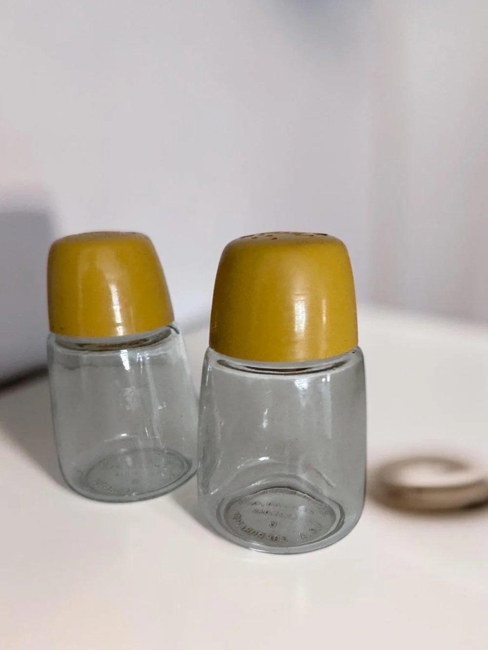 Vintage Mid-Century Modern Glass Salt and Pepper Shakers with Mustard Yellow Lid